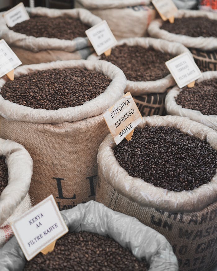 pexels photo 3999940 A vibrant display of various coffee beans in sacks at a market in Istanbul.